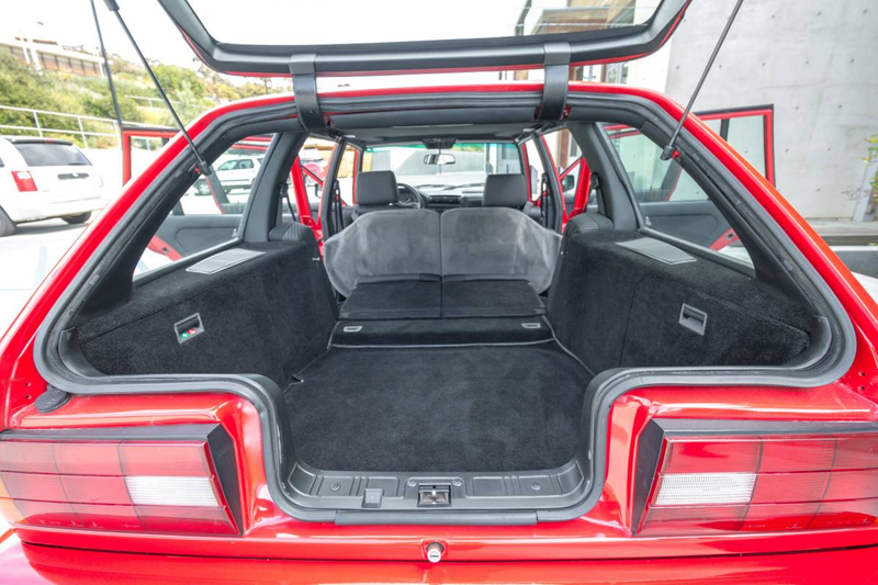 Illustration for article titled At $38,500, Could this Custom 1989 BMW 325i Turbo Touring Make You Throw Caution to the Wind?